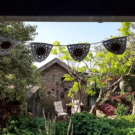 Alojamento de Acomodação e Pequeno-almoço Thuis Bij Elles Zuilichem